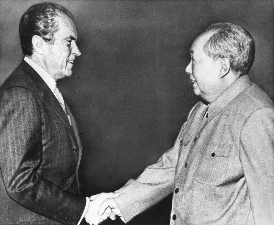 ** FILE** In this Feb 21, 1972 file photo, U.S. President Richard M. Nixon, left, shakes hands with Chinese communist party leader Chairman Mao Zedong during Nixon's groundbreaking trip to China, in Beijing. Forged in absolute secrecy at the height of the Cold War 30 years ago, the diplomatic ties established between the United States and China were meant to balance out the Soviet threat. (AP Photo/File)