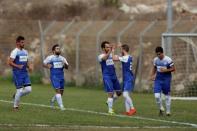 Players from Ariel Municipal Soccer Club, which is affliated with Israel Football Association, play against Maccabi HaSharon Netanya at Ariel Municipal Soccer Club's training grounds in the West Bank Jewish settlement of Ariel September 23, 2016. Picture taken September 23, 2016. REUTERS/Amir Cohen