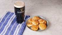 <p>Guinness is an incredibly versatile ingredient, and we love it just as much in savory recipes as in sweet ones. These buttery pretzel bites are stuffed with a gooey Guinness-and-cheese filling, making them the ultimate pairing for a frosty pint.</p><p>Get the <strong><a href="https://www.delish.com/cooking/recipe-ideas/a26556721/guinness-cheese-pretzel-bites-recipe/" rel="nofollow noopener" target="_blank" data-ylk="slk:Guinness Cheese Pretzel Bites recipe;elm:context_link;itc:0;sec:content-canvas" class="link ">Guinness Cheese Pretzel Bites recipe</a> </strong>from Delish.</p>