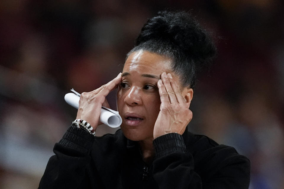 South Carolina head coach Dawn Staley reacts against Texas A&M during the second half of an NCAA college basketball game at the Southeastern Conference women's tournament Friday, March 8, 2024, in Greenville, S.C. (AP Photo/Chris Carlson)