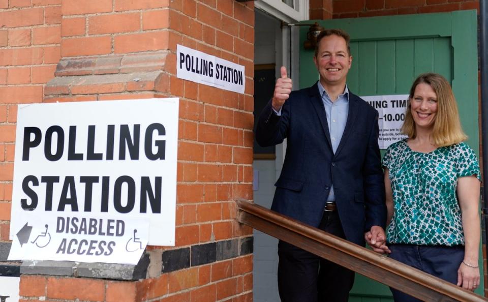 The Liberal Democrats’ by-election candidate Richard Foord (left) poses for a photograph with his wife Kate after they cast their votes at the Uffculme Village Hall in Uffculme, in the Tiverton and Honiton by-election, which was triggered by the resignation of MP Neil Parish for watching pornography in the Commons. Picture date: Thursday June 23, 2022. (PA Wire)