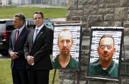 Vermont Governor Peter Shumlin (L) and New York Governor Andrew Cuomo take part in a news conference at the Clinton Correctional Facility in Dannemora, New York June 10, 2015. REUTERS/Chris Wattie