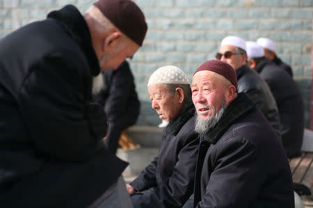 Men gather in a park in China's Linxia, Gansu province, home to a large population of ethnic minority Hui Muslims, February 1, 2018. Picture taken February 1, 2018. REUTERS/Michael Martina