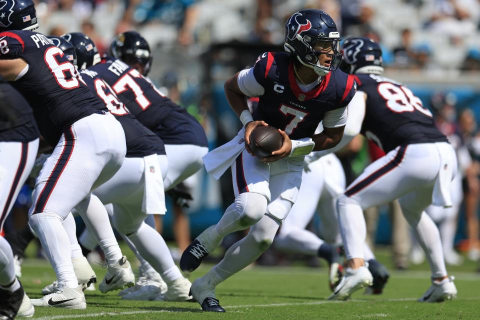 Houston Texans quarterback C.J. Stroud (7) looks to handoff during the third quarter of an NFL football matchup Sunday, Sept. 24, 2023 at EverBank Stadium in Jacksonville, Fla. The Houston Texans defeated the Jacksonville Jaguars 37-17. [Corey Perrine/Florida Times-Union]