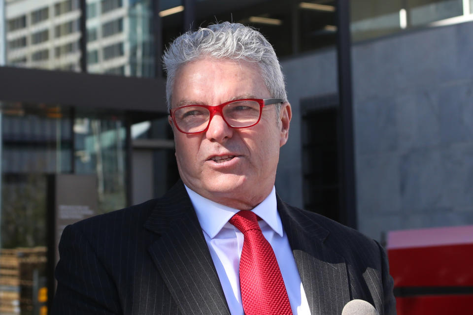 Former Australian Army officer David McBride speaks to the media outside the Australian Capital Territory Supreme Court in Canberra, Australia, on Thursday, Aug. 22, 2019. McBride is one of two whistleblowers who appeared in the court charged separately with leaking classified government information that alleges Australia bugged of East Timor’s Cabinet and potential war crimes committed by Australian troops in Afghanistan. (AP Photo/Rod McGuirk)