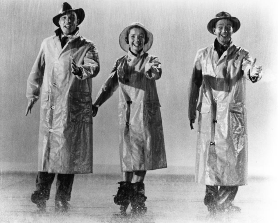 From left to right, actors and singers Gene Kelly, Debbie Reynolds and Donald O'Connor in the musical film 'Singin' in the Rain', 1952. (Photo by Silver Screen Collection/Getty Images)