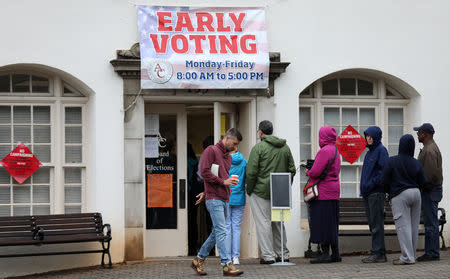 Early voters arrive at a polling station in Athens, Georgia, U.S., October 26, 2018 ahead of the midterm elections. REUTERS/Lawrence Bryant