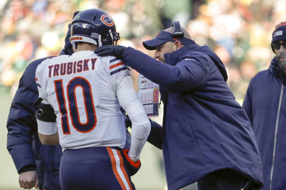 Chicago Bears head coach Matt Nagy talks to Mitchell Trubisky during the first half of an NFL football game against the Green Bay Packers Sunday, Dec. 15, 2019, in Green Bay, Wis. (AP Photo/Matt Ludtke)
