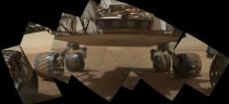 This view of the lower front and underbelly areas of NASA's Mars rover Curiosity combines nine images taken by the rover's Mars Hand Lens Imager (MAHLI) during the 34th Martian day, or sol, of Curiosity's work on Mars (Sept. 9, 2012).