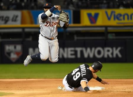 Apr 26, 2019; Chicago, IL, USA; Detroit Tigers second baseman Josh Harrison (1) makes a double play against Chicago White Sox center fielder Ryan Cordell (49) during the second inning at Guaranteed Rate Field. Mandatory Credit: Mike DiNovo-USA TODAY Sports