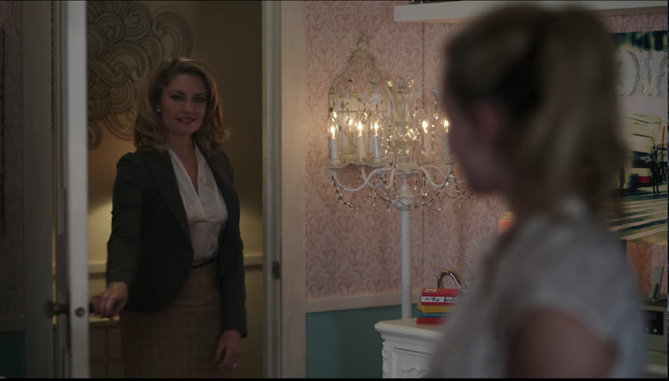Betty's room has a standing chandelier