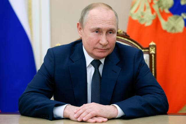 Russian President Vladimir Putin speaks via teleconference to participants of the IX Forum of Regions of Russia and Belarus in Moscow, Russia, Friday, July 1, 2022