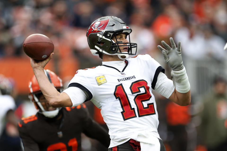 Tampa Bay Buccaneers quarterback Tom Brady (12) throws a pass during the second half of an NFL football game against the Cleveland Browns in Cleveland, Sunday, Nov. 27, 2022. (AP Photo/Ron Schwane)