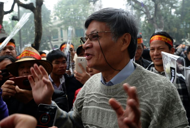 Academic Nguyen Quang A, a leading dissident, speaks at an anti-China rally in Hanoi