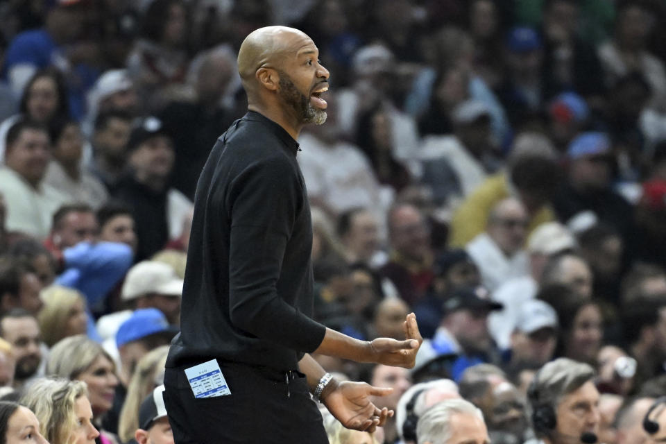 Orlando Magic head coach Jamahl Mosley yells to players during the first half against the Cleveland Cavaliers in Game 1 of an NBA basketball first-round playoff series, Saturday, April 20, 2024, in Cleveland. (AP Photo/Nick Cammett)