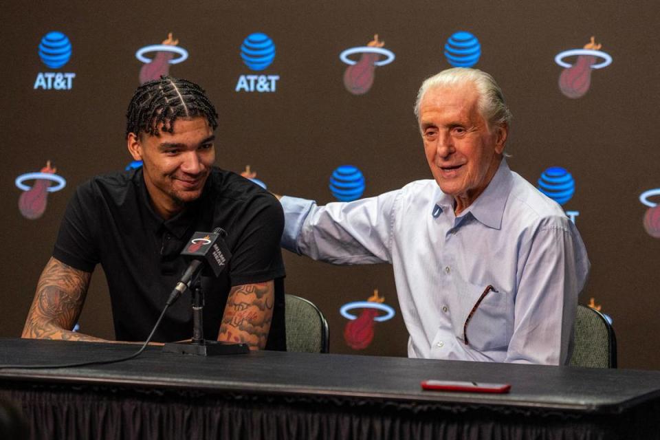 Miami Heat center Kel’el Ware, left, is introduced by Team President Pat Riley, right, during Ware’s first press conference at Kaseya Center on Friday, June 28, 2024, in Miami, Fla.