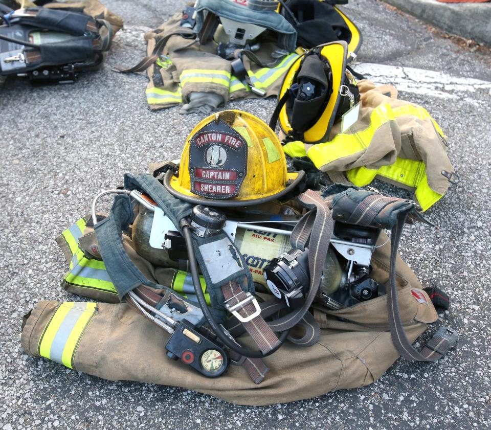 Fire gear is shown prior to the Memorial Climb on the steps of the McKinley Presidential Library & Museum in Canton on Saturday. The event marked the 20th anniversary of the 9/11 attacks and recalled the memory of the 343 firefighters who lost their lives that day.