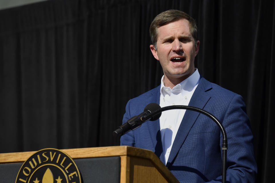 Kentucky Gov. Andy Beshear speaks during a vigil for the victims of Monday's shooting at the Old National Bank in Louisville, Ky., Wednesday, April 12, 2023. (AP Photo/Timothy D. Easley)