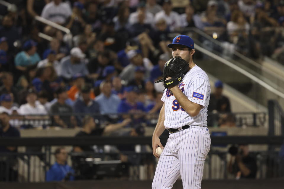 New York Mets pitcher Grant Hartwig looks on before getting pulled during the sixth inning of a baseball game against the Seattle Mariners, Saturday, Sept. 2, 2023, in New York. (AP Photo/Jason DeCrow)