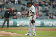 Detroit Tigers' Edwin Jackson reacts after giving up a two-run home run to Chicago White Sox's Danny Mendick, during the sixth inning of game one of a baseball doubleheader, Saturday, Sept. 28, 2019, in Chicago. Ryan Cordell scored on a play. (AP Photo/Kamil Krzaczynski)