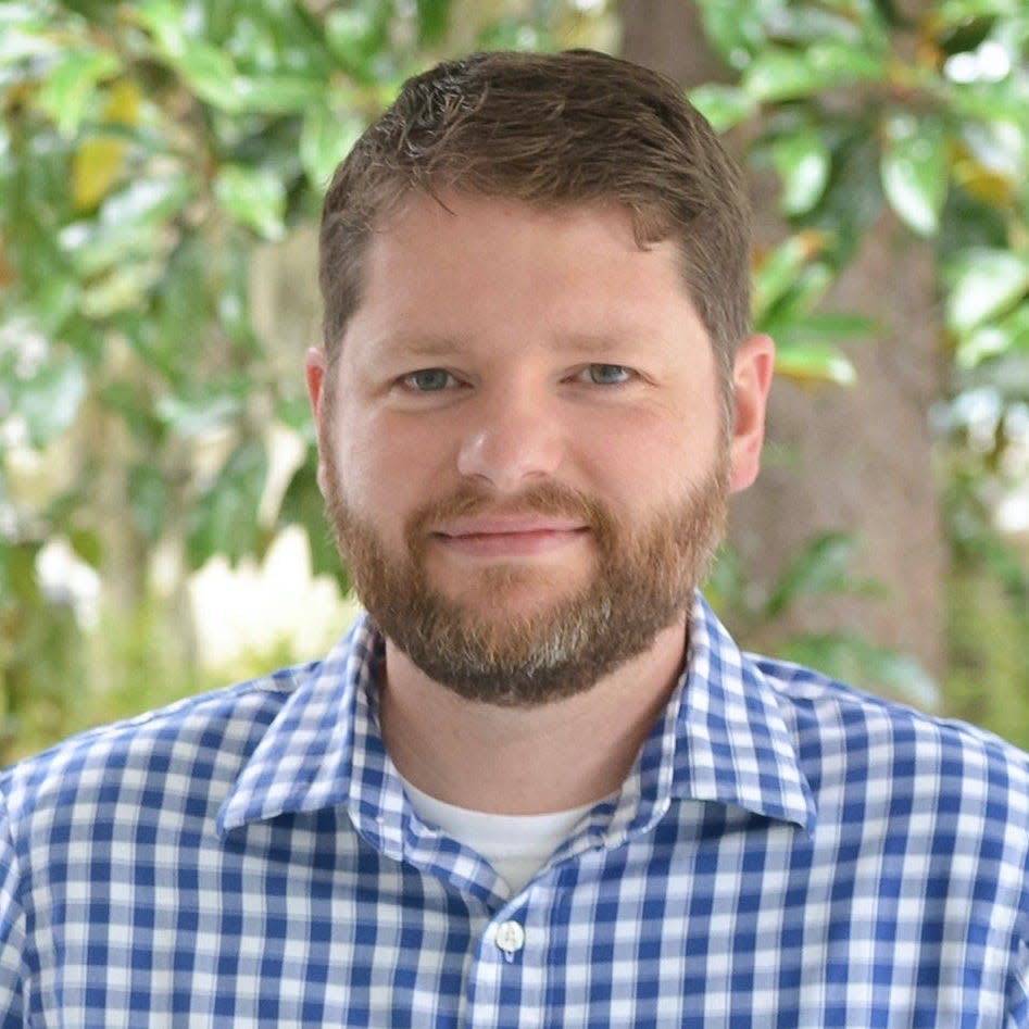 Jordan Dominy, a Savannah State University associate professor of English, chairs the university's College of Liberal Arts and Social Sciences (CLASS) faculty senate caucus.