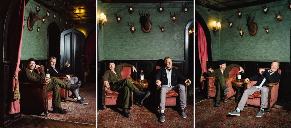 Aaron Paul and Bryan Cranston in the lobby of the Bowery Hotel.