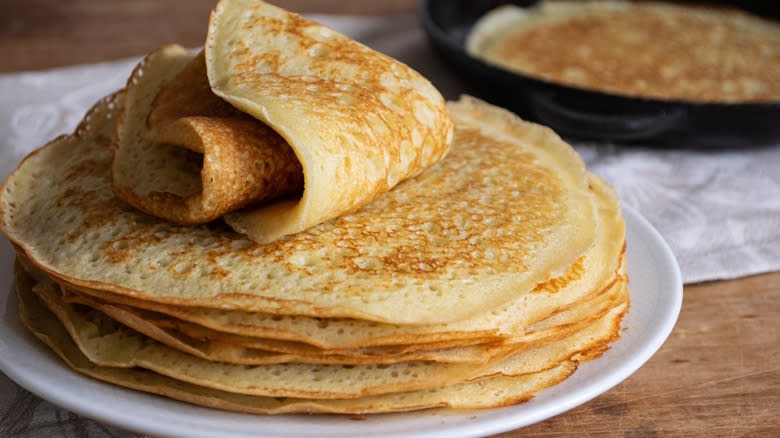 Stack of crepes on plate