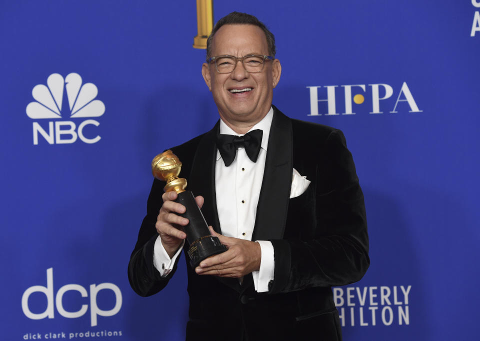 Tom Hanks, winner of the Cecil B. deMille Award, poses in the press room at the 77th annual Golden Globe Awards at the Beverly Hilton Hotel on Sunday, Jan. 5, 2020, in Beverly Hills, Calif. (AP Photo/Chris Pizzello)