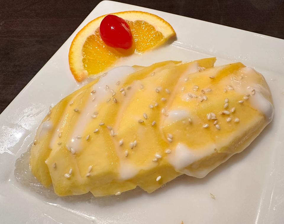 Always a delicious ending to a Thai meal, fresh mango served atop sticky rice with coconut milk does not disappoint at Sengchanh in Perry Township.