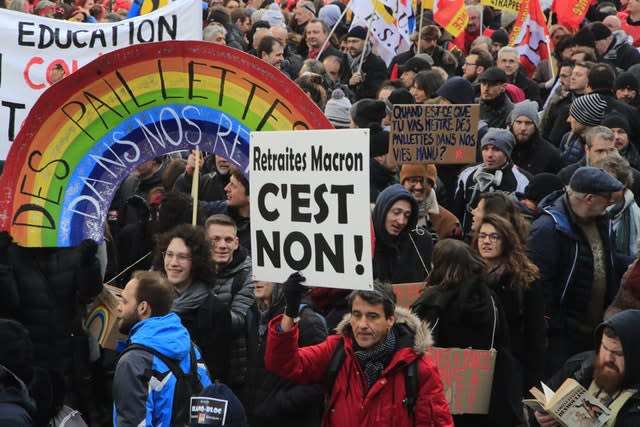 Protesters march during a demonstration in Paris 