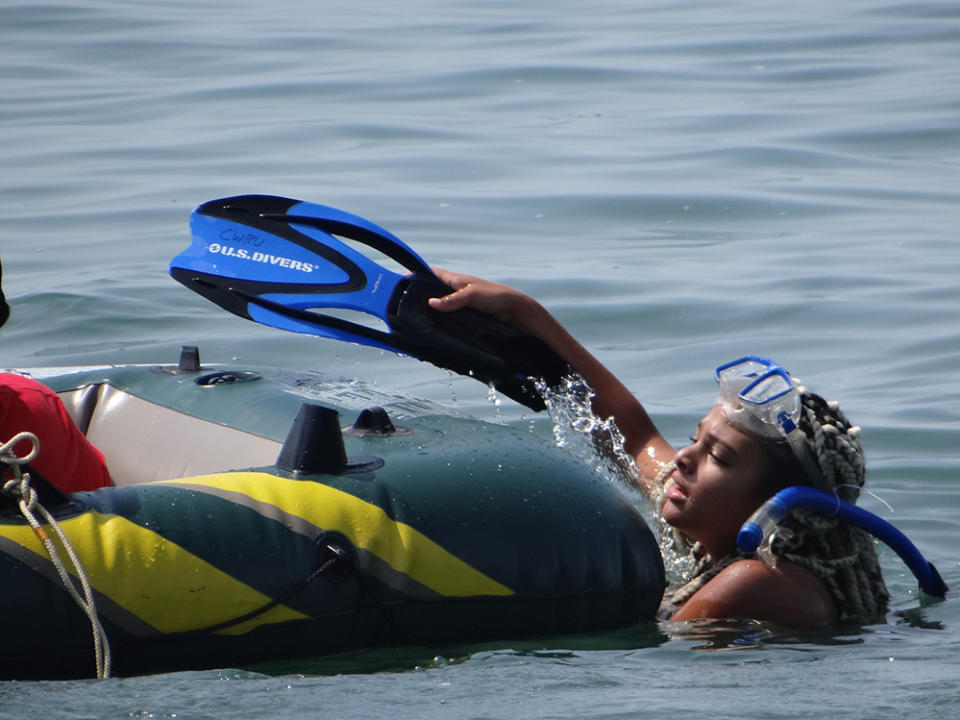 Students used goggles, face masks, snorkels and flippers to try to spot wreckage of the W.R. Hanna and Adventure. (Patrick O’Donnell)