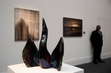 The sculpture 'Black Phoenix' by Paul Fryer which forms part of a forthcoming charity auction for the survivors of the London Grenfell Tower fire, is seen on display at Sotheby's in London, Britain, October 12, 2017. REUTERS/Toby Melville