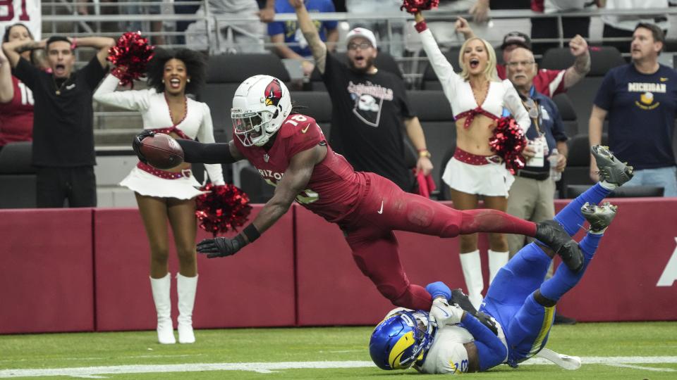 Arizona Cardinals wide receiver Marvin Harrison Jr. catches a touchdown against the Los Angeles Rams during the first half of an NFL football game Sunday, Sept. 15, 2024, in Glendale, Ariz. (AP Photo/Rick Scuteri)