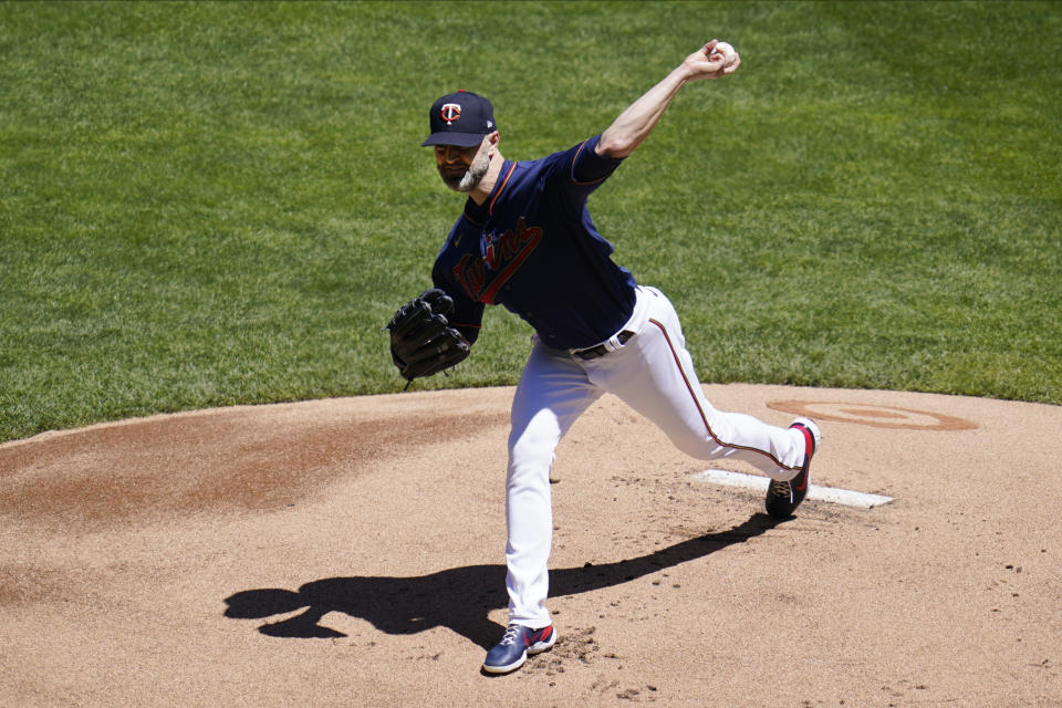 Minnesota Twins' pitcher J.A. Happ throws against the Kansas City Royals in the first inning of a baseball game, Saturday, May 29, 2021, in Minneapolis. (AP Photo/Jim Mone)