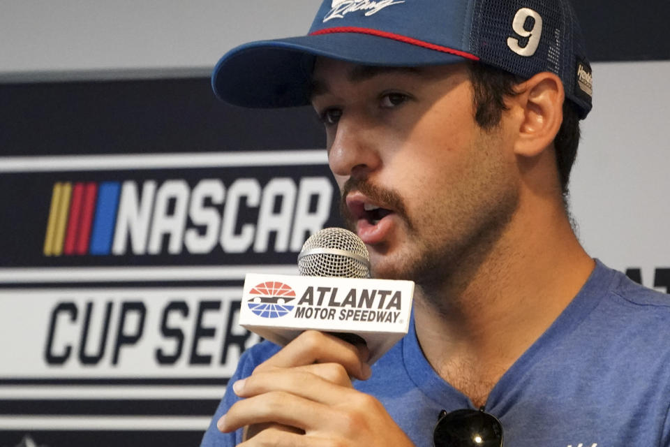 Driver Chase Elliott speaks to the media during a weather delay before qualifying the NASCAR Cup Series auto race at Atlanta Motor Speedway in Hampton, Ga., on Saturday, July 9, 2022. (AP Photo/Bob Andres)