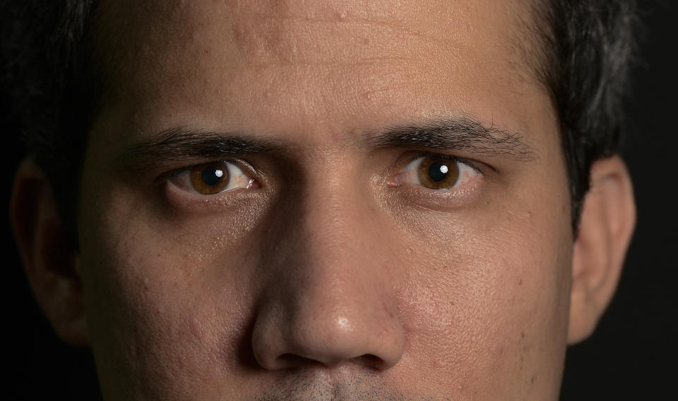 In this Dic. 16, 2019 photo, venezuela's National Assembly President and self-proclaimed interim President Juan Guaido poses for a photo during a interview in Caracas, Venezuela. Guaido, the hand-picked successor to then-detained opposition leader Leopoldo Lopez, leaped onto the stage in January at a dark moment in the once-wealthy nation's history. (AP Photo/Matias Delacroix)