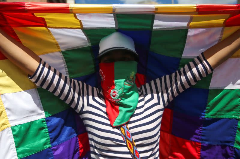 Demonstrators take part in a protest as a national strike continues in Bogota