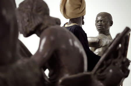 Statues are seen in Belgium's Africa Museum before its reopening to the public on December 9, 2018, after five years of renovations to modernise the museum from pro-colonial propaganda exhibits to one that condemns colonisation, in Tervuren, Belgium December 6, 2018. Picture taken December 6, 2018. REUTERS/Yves Herman