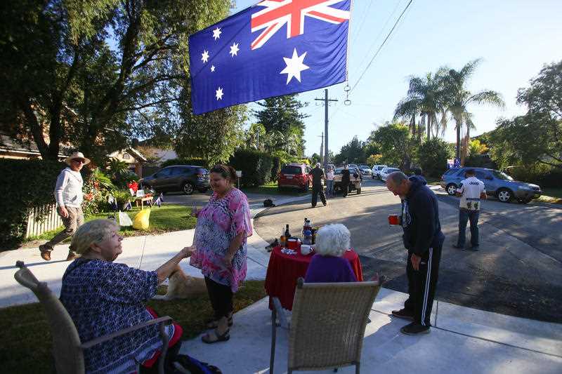 Residents of Rydalmere in Sydney's northwest commemorate on their front lawns. Source: AAP  