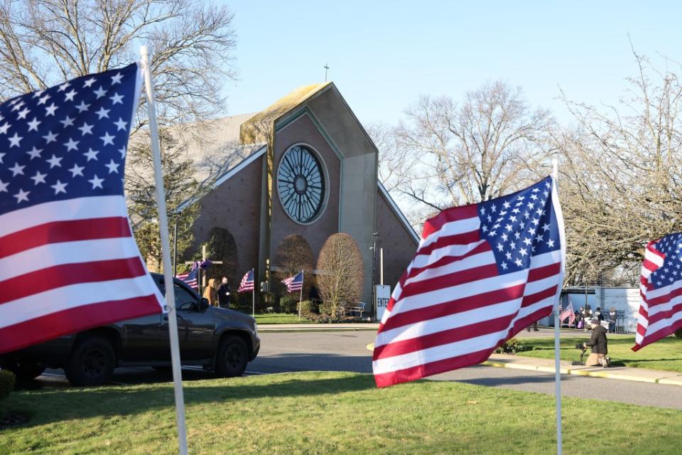 Preparation begins outside the St. Rose of Lima RC Church in Massapequa. Dennis A. Clark