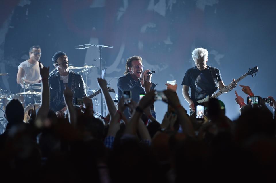 Larry Mullen Jr., left, The Edge, Bono and Adam Clayton of U2 perform at the Apollo Theater in New York in 2018. The band's Las Vegas shows will be their first time playing since 2019 - and also the first time playing without founding drummer Larry Mullen Jr.