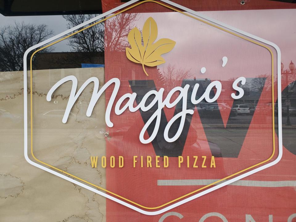 Maggio's sign is up, and work is ongoing inside.