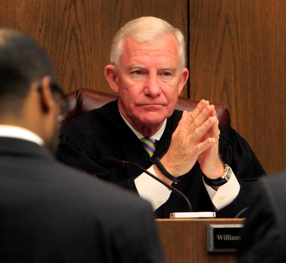 Mike Haskey mhaskey@ledger-enquirer.com Superior Court Judge William C. Rumer presides Thursday morning over the murder trial of Jarvis Alexander and Joshua Leonard, both charged in the death of Calvin Grimes. 10/30/14