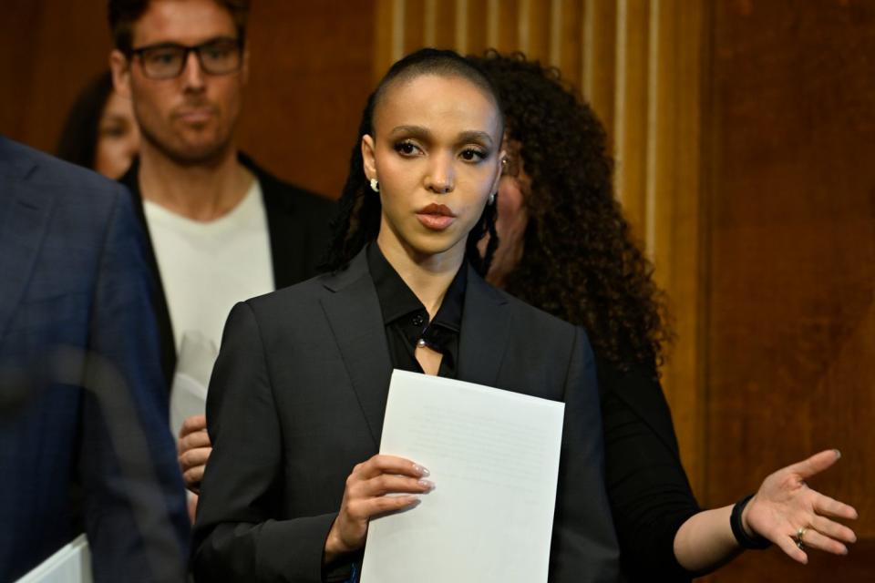 <p>Shannon Finney/Getty</p> FKA twigs arrives for Congressional Testimony NO FAKES Act at Dirksen Senate Office Building on April 30, 2024 in Washington, DC