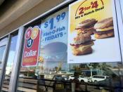 FILE PHOTO: Dollar Menu advertisements are seen outside a McDonald's restaurant in Venice, California