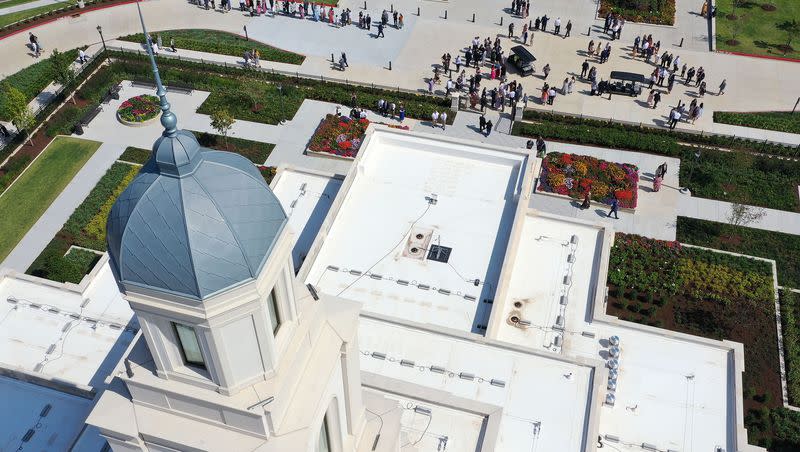 Latter-day Saints leave the Bentonville Arkansas Temple after the first dedicatory session in Bentonville, Arkansas, on Sunday, Sept. 17, 2023. The session was part of a historic day as church leaders dedicated three temples on a single day for the first time.