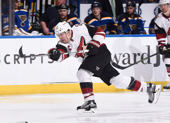 ST. LOUIS, MO - APRIL 4: Shane Doan #19 of the Arizona Coyotes takes a shot against the St. Louis Blues at the Scottrade Center on April 4, 2015 in St. Louis, Missouri. (Photo by Scott Rovak/NHLI via Getty Images)