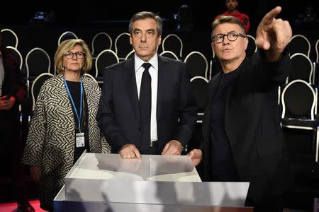 Francois Fillon of the Republicans party arrives at the television studio where the eleven candidates will attend a prime-time televised debate for the French 2017 presidential election in La Plaine Saint-Denis, near Paris, France, April 4, 2017. REUTERS/Lionel Bonaventure/Pool