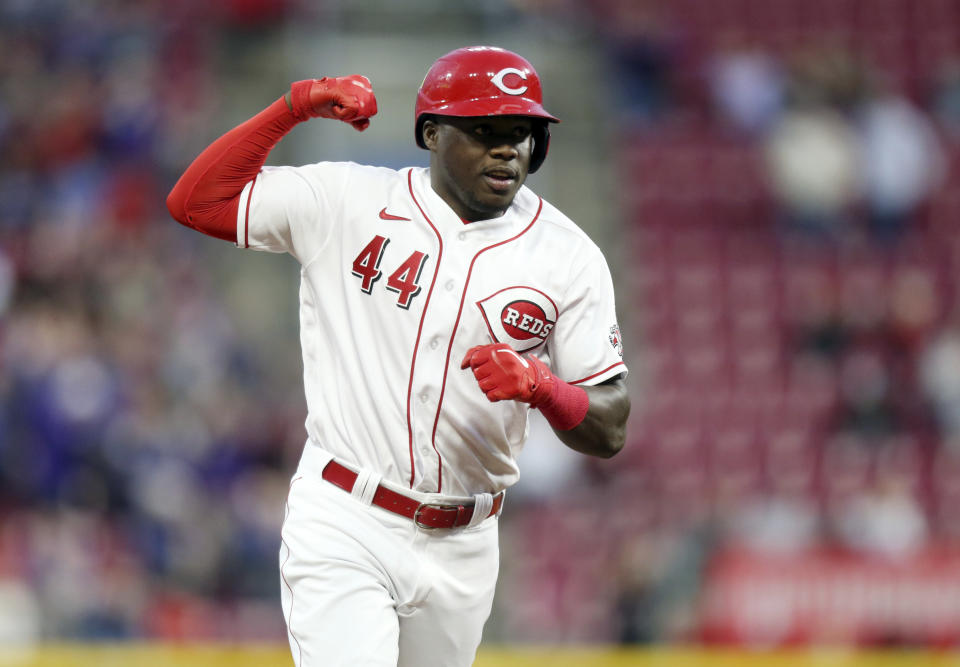 Cincinnati Reds' Aristides Aquino runs the bases after his two-run home run against the Chicago Cubs during the sixth inning of a baseball game in Cincinnati, Monday, May 23, 2022. (AP Photo/Paul Vernon)