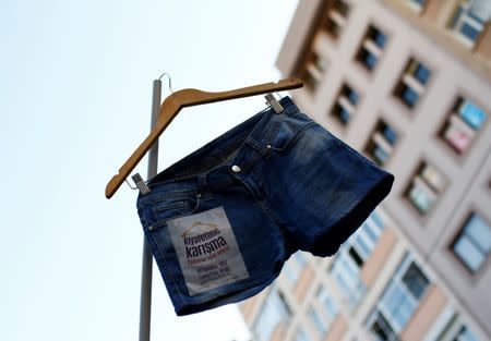 Women rights activists display shorts with a slogan that reads, "Don't Mess With My Outfit" during a protest against what they say are violence and animosity they face from men demanding they dress more conservatively, in Istanbul, Turkey, July 29, 2017. REUTERS/Murad Sezer